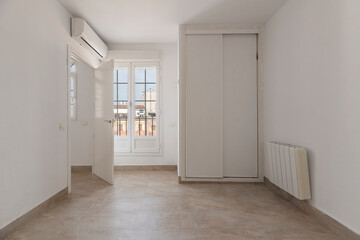 Bedroom wardrobe with soft-close system and adjustable interior compartments