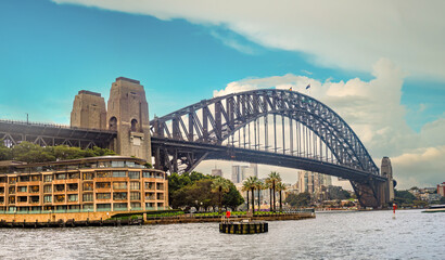 Obraz premium Panorama of Harbor Bridge (the Coathanger) from Circular Quay, Sydney, New South Wales, Australia