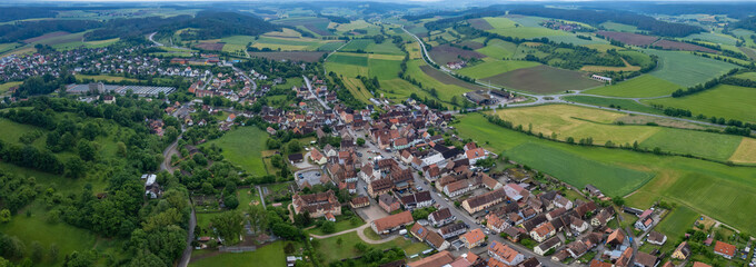 An aerial panorama view Around the old town of the City Neuhof an der Zenn In Germany on a cloudy...