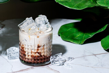 Snickertini, winter alcoholic cocktail drink with chocolate and caramel sauce, vodka, amaretto,...