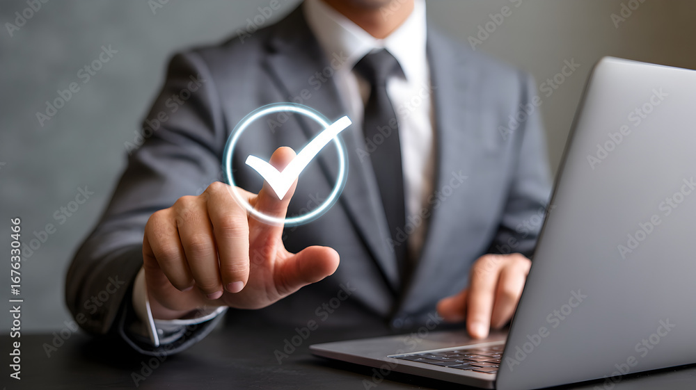 Poster businessman in formal suit using laptop while pressing virtual check mark symbol representing approv