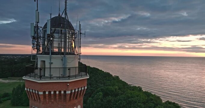 Beautiful Rewal Lighthouse at Sunset in Poland.