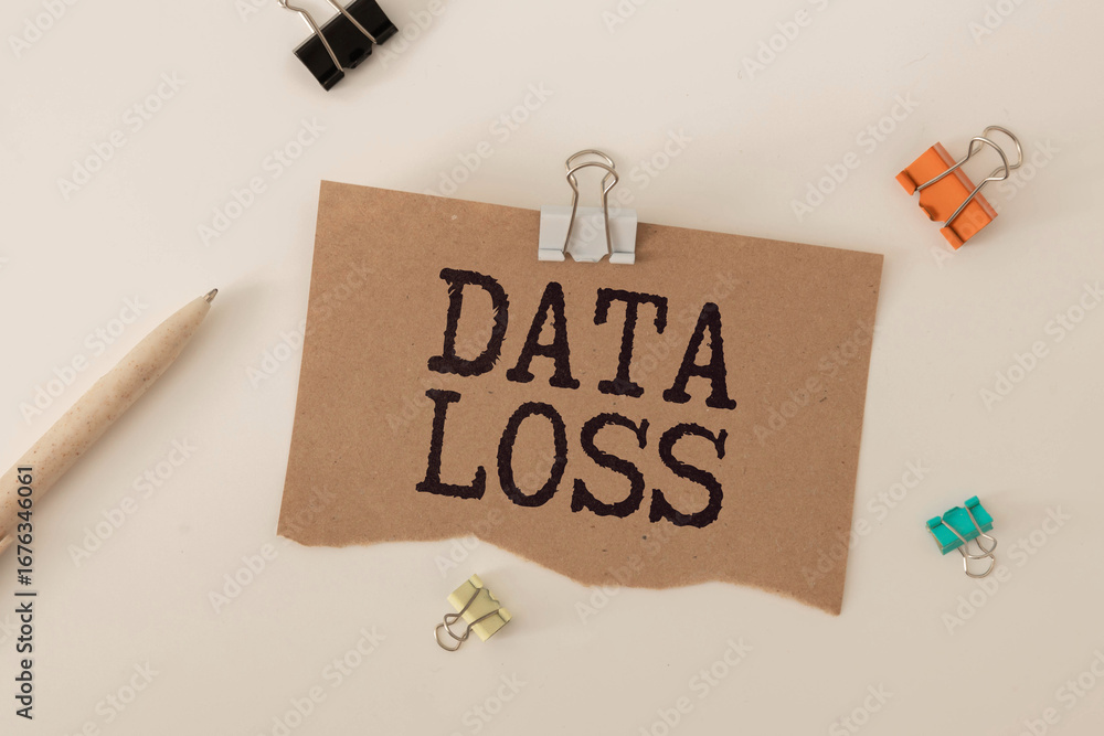 Poster text data loss on tablet display in businessman hands on the white background.