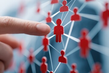 A finger points to a central figure in a network of interconnected red figures