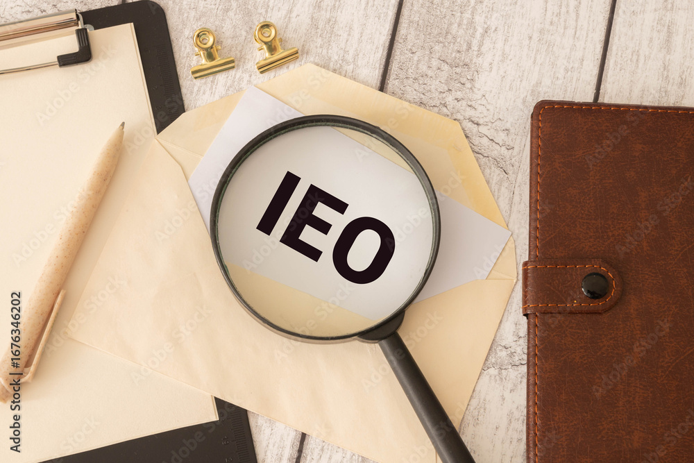 Poster there is notebook with the word ieo. it is an abbreviation.