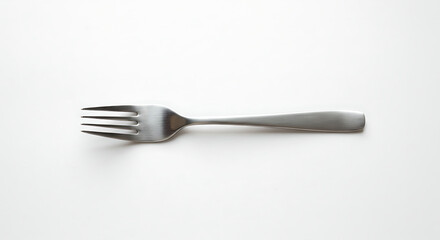 Single Stainless Steel Fork Laying Flat on a Clean White Surface, Minimalist Kitchen Still Life Photography and Eating Utensil, Restaurant