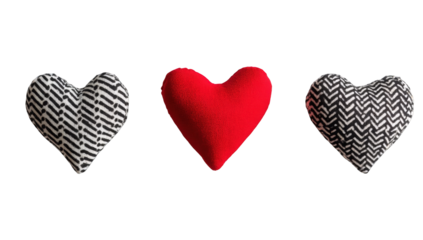 Three fabric hearts in black and white chevron and red