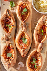 Delicious fruste Margherita made of tomatoes, basil and cheese.