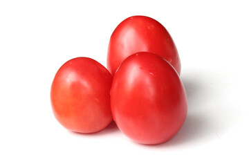 Ripe red tomatoes on white background