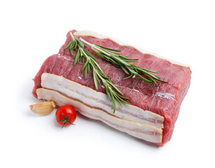 Piece of raw beef meat, tomato and spices isolated on white