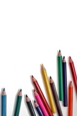  A dynamic and playful arrangement of colorful pencils scattered randomly across the frame, creating a lively and engaging visual. Ideal for projects related to spontaneity, art, or play.