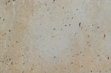 Pocked cement wall
