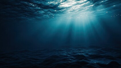 Underwater scene, sunlight beams through dark water (1)