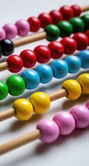 Colorful wooden abacus with rows of beads in various hues