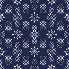 Geometric ethnic seamless pattern with snowflakes. Design for fabric, texture, batik, fabric, patchwork, hand stitched, embroidery, wallpaper, background, illustration, curtain, carpet and wrapping.