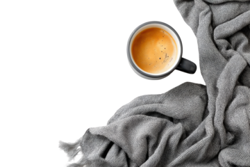 Overhead view of coffee and a gray blanket