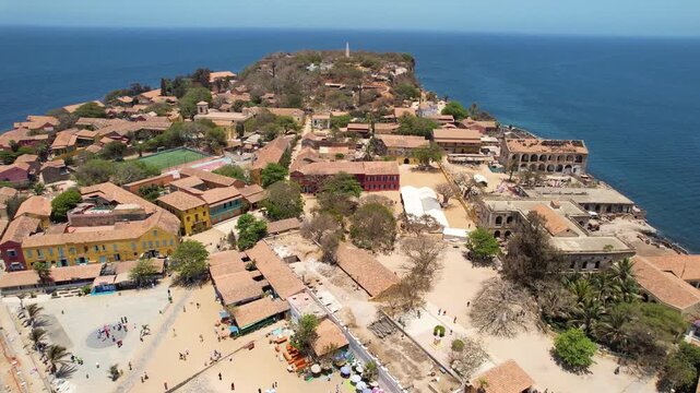 SENEGAL - 7.14.2025 - Incredible aerial footage over Senegal's Goree Island, a former hub of the slave trade, showcases the coastline, fields and monuments.