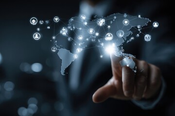Global network concept, hand pointing at a world map with interconnected icons