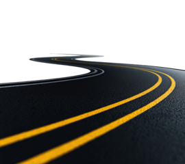 A curving road at night