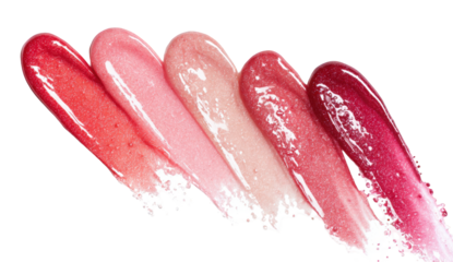 Swatches of glossy lip products in various shades of pink and red