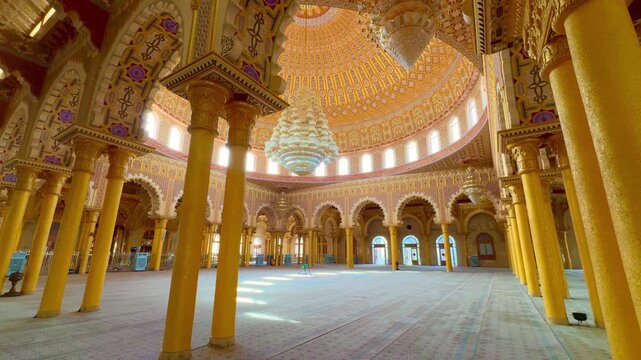 SENEGAL - 7.14.2025 - A chandelier hangs in the Massalikoul Djinane Mosque in Dakar, Senegal.