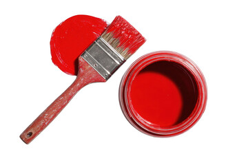 Red paint and brush on a black background
