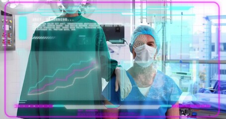 Gloved doctor scanning colleague chest with scanner in OR interface cycling diagnostic data - Powered by Adobe