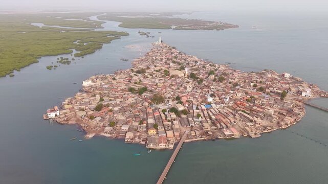 SENEGAL - 7.31.2025 - Incredible aerial footage circling counterclockwise around the island of Joal-Fadiouth, Senegal.