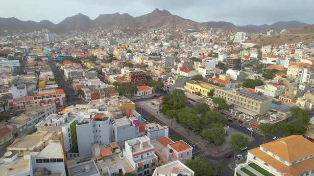 CAPE VERDE - 8.20.2025 - Amazing aerial footage moving over colorful buildings in the city of Mindelo on Sao Vicente, Cape Verde.
