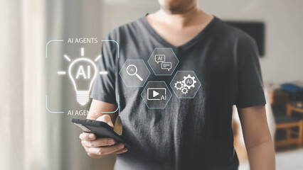 A man holds a smartphone displaying holographic icons for various AI agent functions like search, chat, and automation in a modern setting.