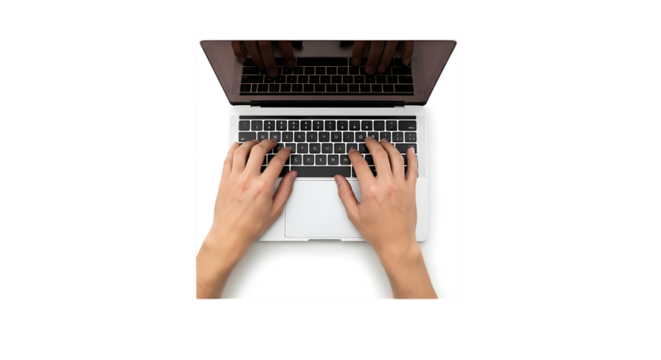 Overhead view of hands typing on a modern laptop keyboard