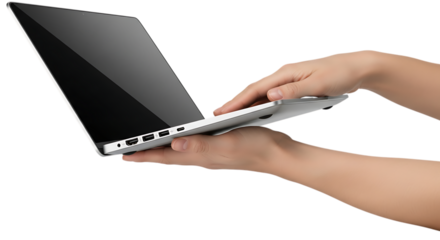 Person holding and using a modern laptop computer with a black background
