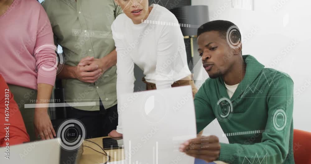 Poster man in green sweater picking up report in business meeting, animating data overlays showing metrics