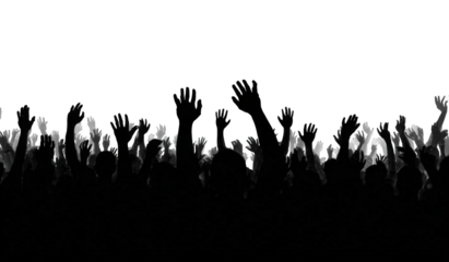 Silhouettes of people raising hands in darkness