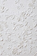 Textured White Wall Pattern with Floral Relief