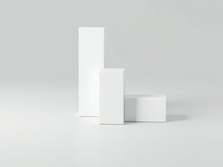 Minimalist arrangement of white geometric shapes on a clean white background