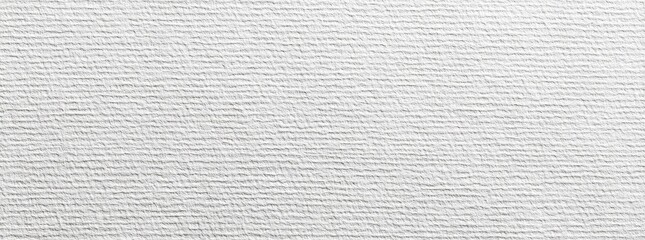 Close-up view of a textured, white surface with horizontal lines
