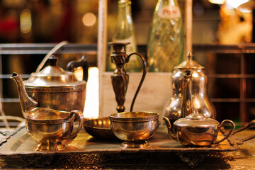 Colorful kitchen and shelf displaying antique-style dishes