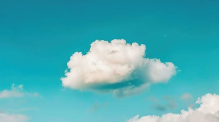 Fresh and Light Summer Vibe: Fluffy White Clouds Over Clear Blue Sky on Sunny Day