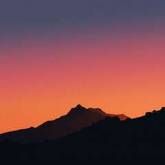 Obraz premium Silhouette of mountain range at sunset