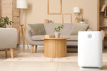Fototapeta premium Modern humidifier on floor in living room