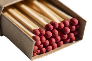 Red tipped matches in a cardboard box, ready to strike.