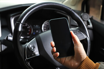 The driver searches for directions on his phone.