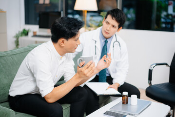Obraz premium Doctor Comforts Stressed Male Patient During Mental Health Consultation