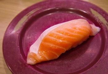 Classic Japanese Salmon Nigiri – Fresh Raw Salmon Over Vinegared Rice

 Served on Purple Plate