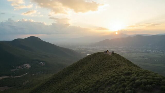 Aerial view of Crete island, Greece. Mountain landscape, olive groves, cloudy sky in sunset light