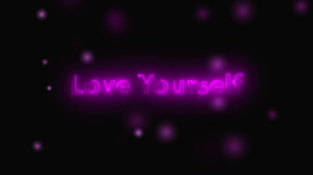 Purple neon glowing love yourself text animation dark background positive affirmation mental health. Love yourself neon purple glowing text animation dark background.