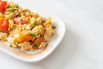 stir-fried tomatoes with egg on plate