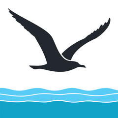 Dark silhouette of a seagull flying over blue ocean waves bird wings