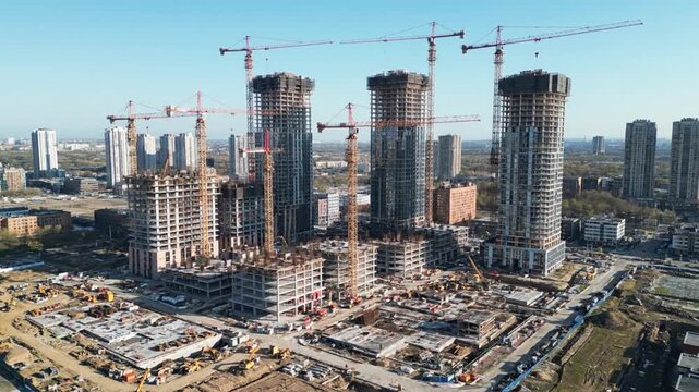 Panoramic view of an ambitious urban construction site, featuring numerous high-rise towers in various stages of development, signifying rapid metropolitan expansion